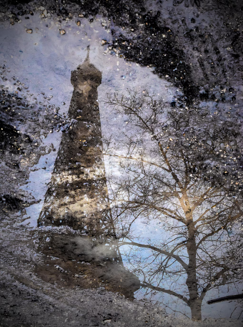 A muddy view of the Eiffel Tower